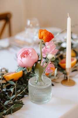 Wedding breakfast table centerpieces and reception flower arrangements at Hyde House